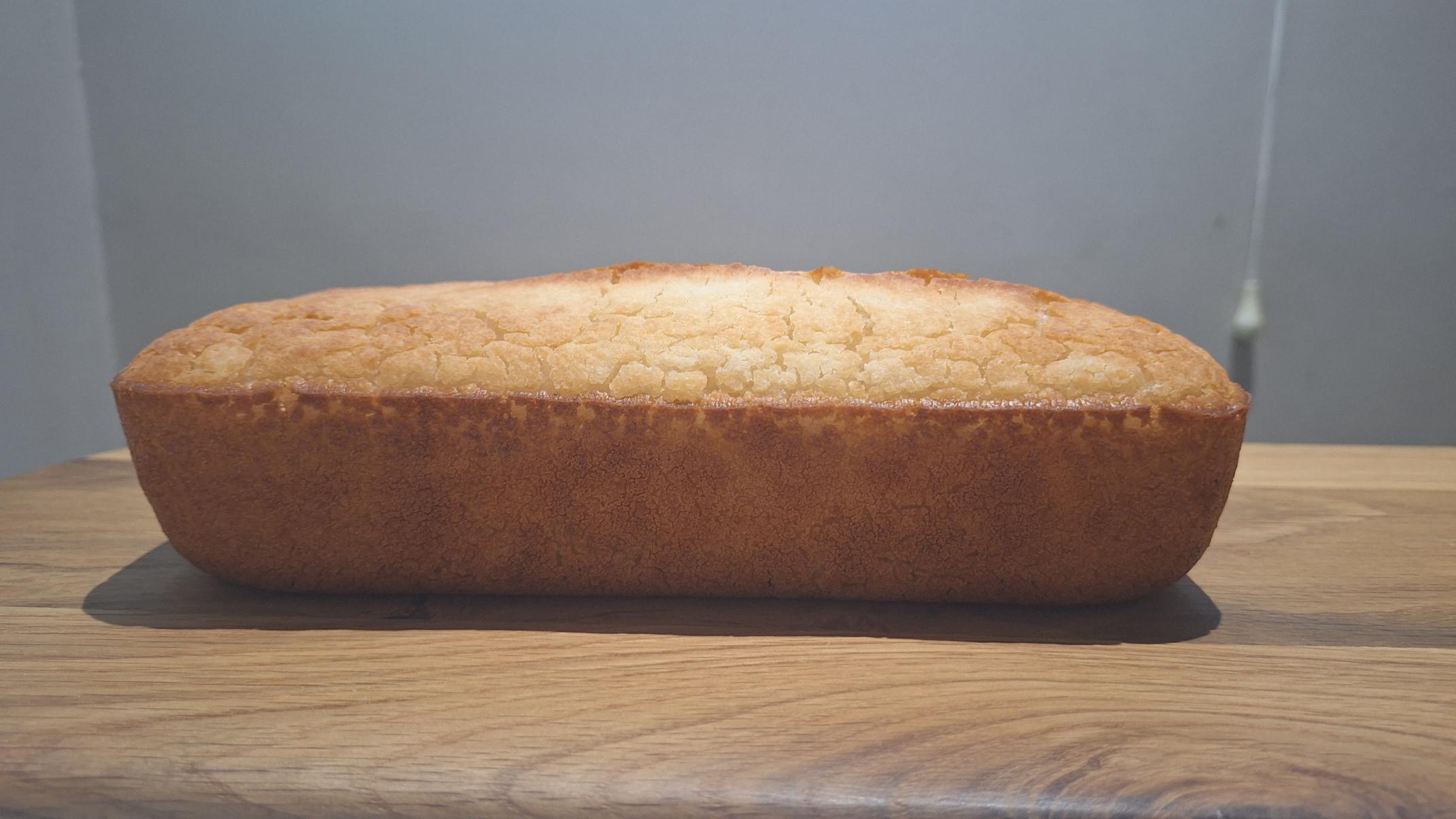 Bread from the side. Bread had a swelling at the top, not perfectly flat and baked in a pan with no lid 