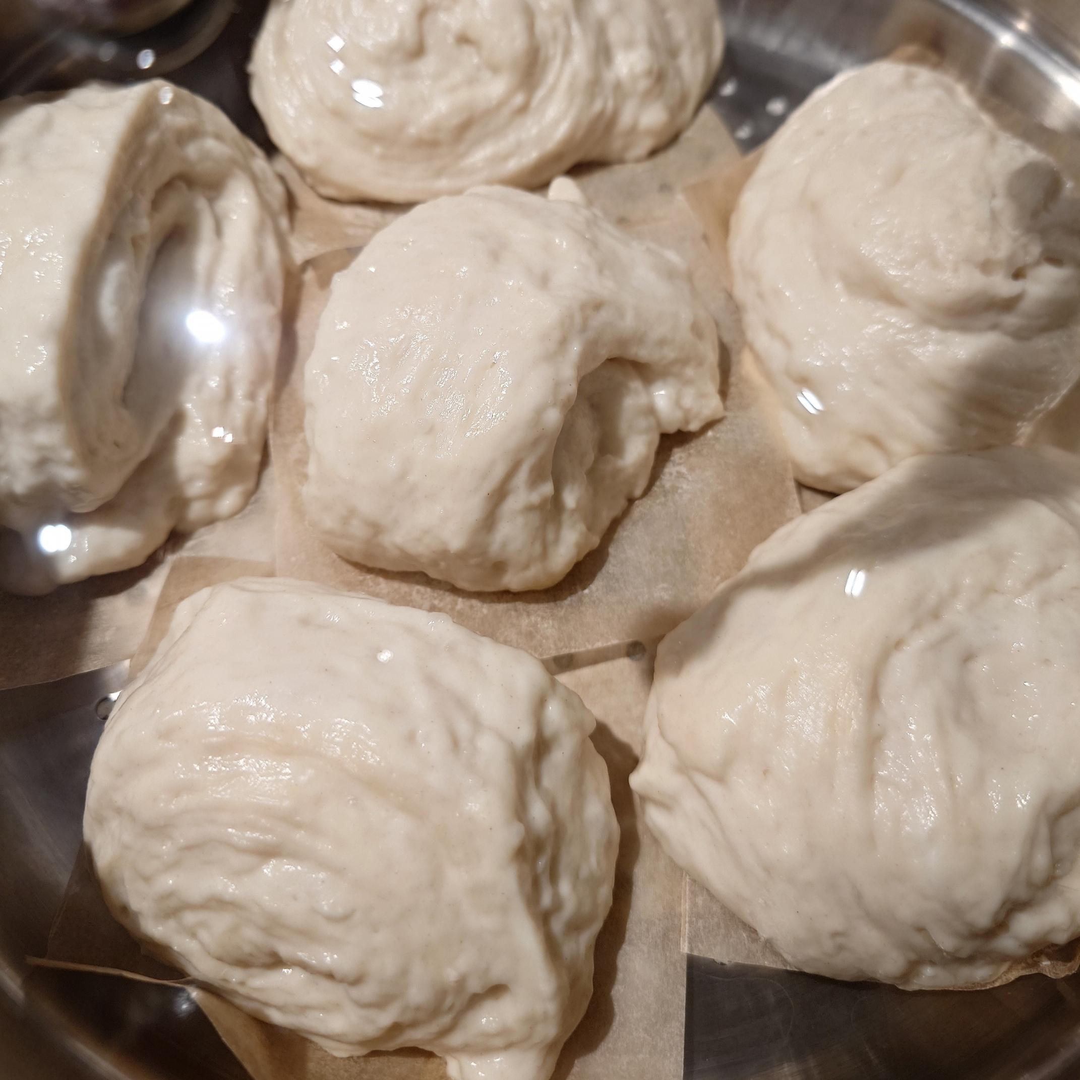 Shaped but unsteamed mantou in a steamer insert