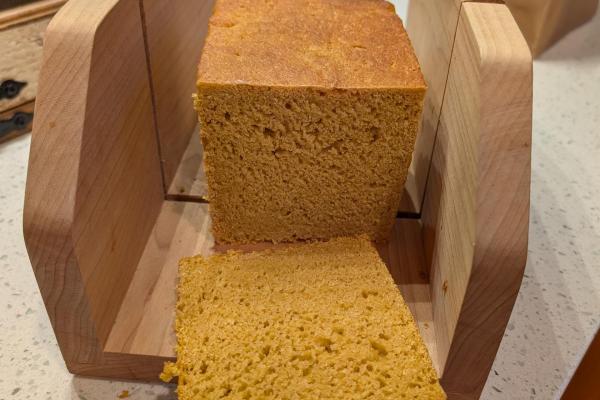 Sweet potato loaf sliced showing color and crumb