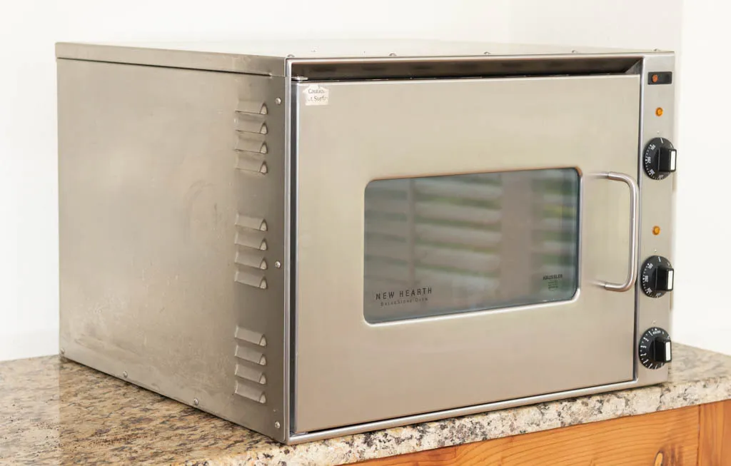 A stainless steel Haussler oven on a countertop